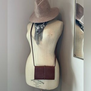 Fossil crossbody/clutch wallet.